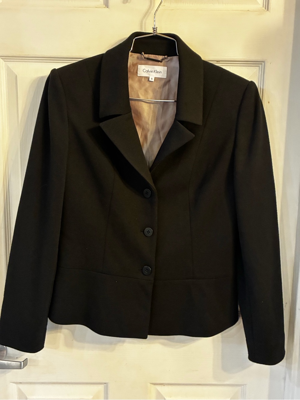 Calvin Klein black tailored blazer with a three-button front closure, Size: 8